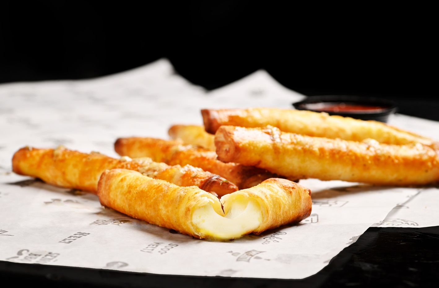 Nuevos Garlic Mozza Sticks se convierten en el producto más exitoso del año en Melt Pizzas